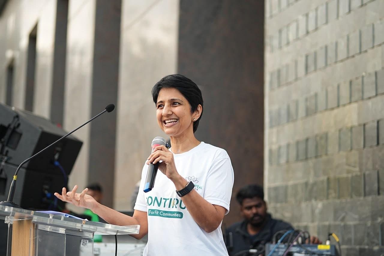 Dr. Rajeshwari Reddy speaking at the Continental Hospitals CONTIRUN — For Fit Communities event