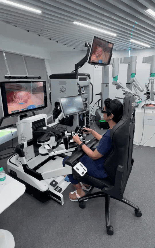 Dr. T. Rajeshwari Reddy performing robotic surgery at the SSI Mantra console, Continental Hospitals Hyderabad