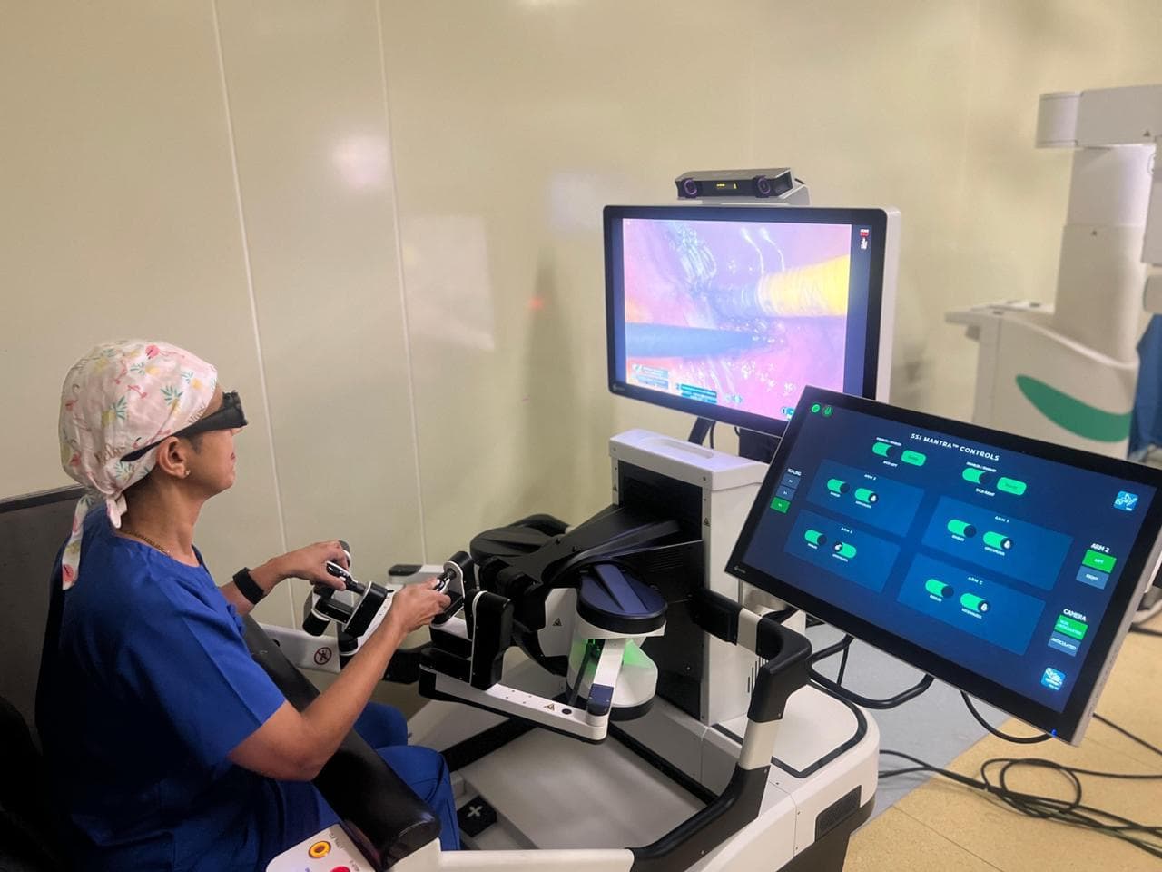 Dr. T. Rajeshwari Reddy performing robotic surgery at the SSI Mantra console